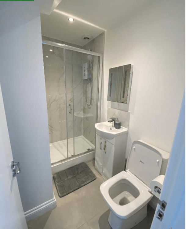 combine shower and toilet